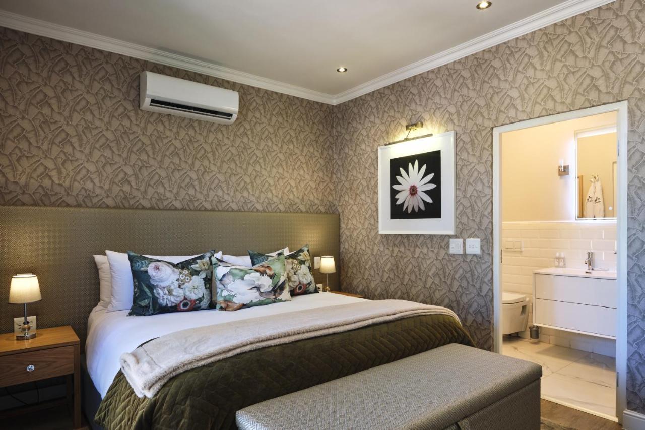 Alluvia Boutique Winery & Luxury Accommodation Στέλενμπος Εξωτερικό φωτογραφία A bedroom at the Cape Heritage