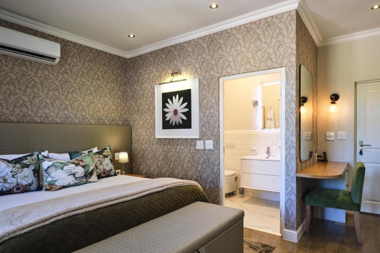 Alluvia Boutique Winery & Luxury Accommodation Στέλενμπος Εξωτερικό φωτογραφία A bedroom at the Cape Heritage