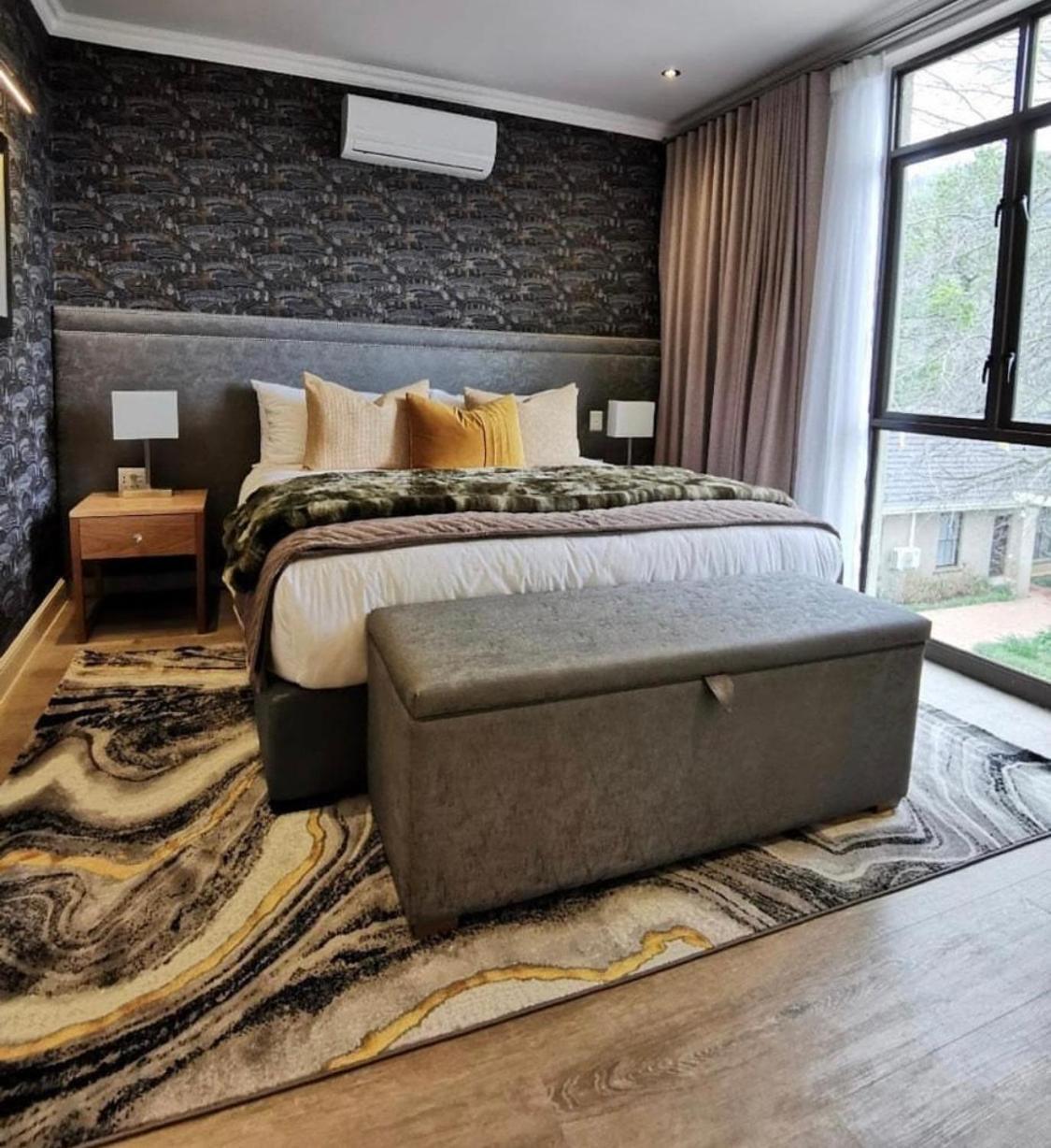 Alluvia Boutique Winery & Luxury Accommodation Στέλενμπος Δωμάτιο φωτογραφία A bedroom with a storage bench