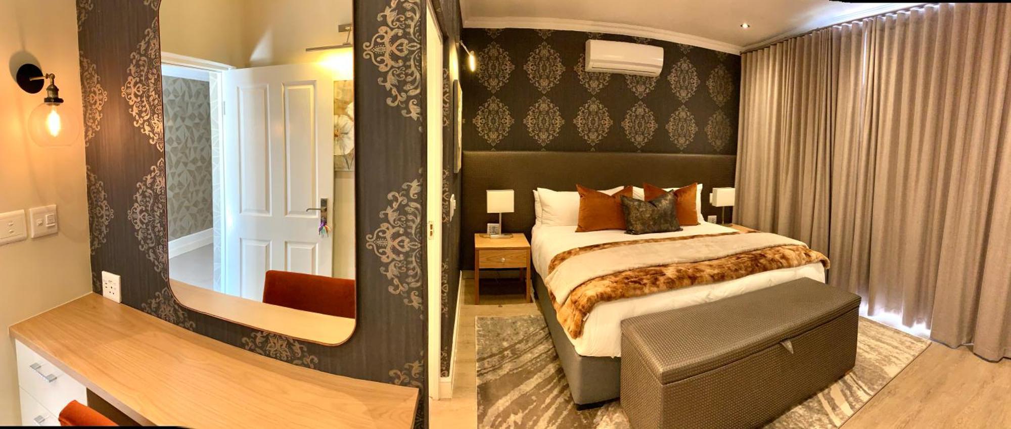 Alluvia Boutique Winery & Luxury Accommodation Στέλενμπος Δωμάτιο φωτογραφία A bedroom at the Cape Heritage